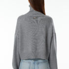 Cropped turtle neck sweater in 100% Extrafine Merino, dropped long sleeves