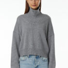 Cropped turtle neck sweater in 100% Extrafine Merino, dropped long sleeves