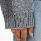 Cropped turtle neck sweater in 100% Extrafine Merino, dropped long sleeves