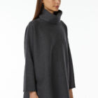 High-neck poncho in 100% Extrafine Merino, fabric stitch,