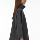 High-neck poncho in 100% Extrafine Merino, fabric stitch,