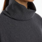 High-neck poncho in 100% Extrafine Merino, fabric stitch,