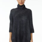 Turtle neck sweater in 100% Extrafine Merino with dropped sleeves below the elbow