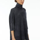 Turtle neck sweater in 100% Extrafine Merino with dropped sleeves below the elbow