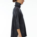 Turtle neck sweater in 100% Extrafine Merino with dropped sleeves below the elbow