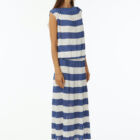 Pleated shiny viscose dress with elastic band at waist, dropped sleeve boat neck. Length at ankle.