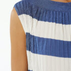 Pleated shiny viscose dress with elastic band at waist, dropped sleeve boat neck. Length at ankle.