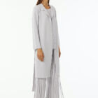 Lurex trench double knit with reverse neck and belt.