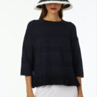 Crew neck sweater in 100% cotton, horizontal flat rib slim vestibility, cotton fringes at bottom.