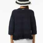 Crew neck sweater in 100% cotton, horizontal flat rib slim vestibility, cotton fringes at bottom.