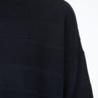 Crew neck sweater in 100% cotton, horizontal flat rib slim vestibility, cotton fringes at bottom.