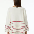 Boat neck oversized pull in 100% cotton stripes at bottom in various colors a line 7/8 sleeve wide vestibility.