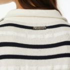 Polo neck sweater with 7/8 sleeves white background with contrasted colour stripes, spongy yarn inserts, regular vestibility.