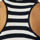 American neckline tank top in ribbed and striped stretch viscose. Quite fitted vestibility.