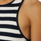 American neckline tank top in ribbed and striped stretch viscose. Quite fitted vestibility.