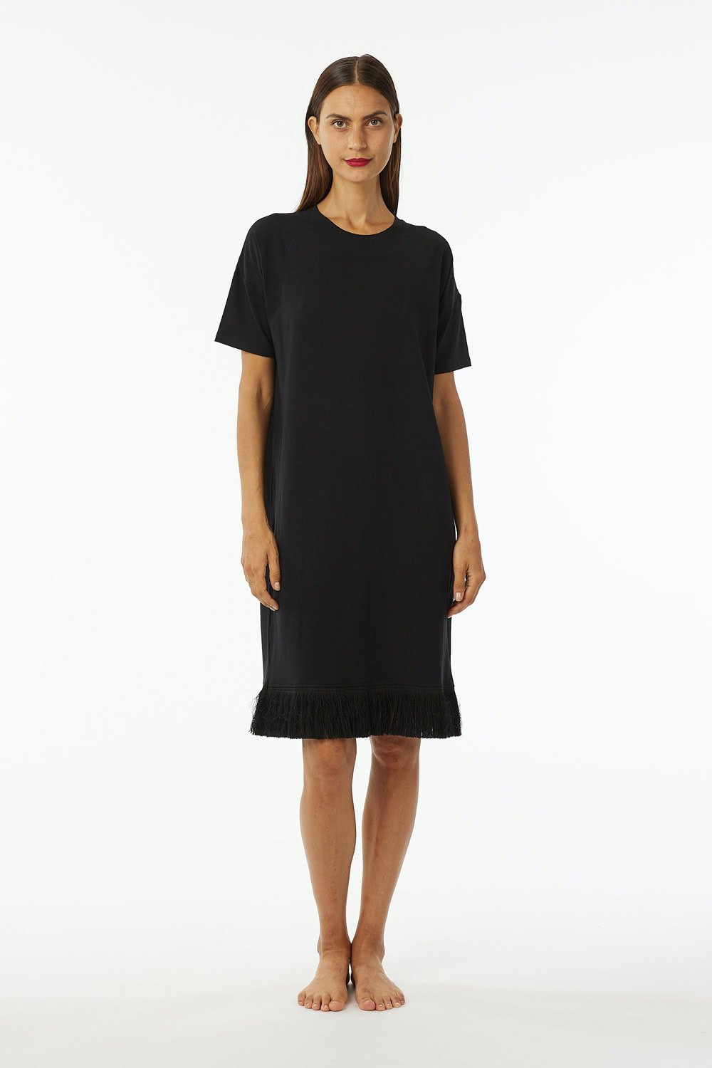 Crew neck dress in Stretch viscose jersey with short sleeves length at knee and 100% cotton fringes.