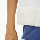 Crew neck tank top in stretch viscose jersey with 100% cotton fringes. Regular vestibility.