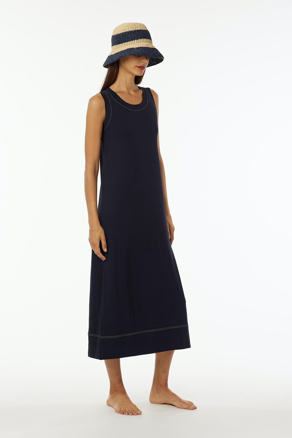 Long sleeveless dress in viscose jersey round neck slightly a line.